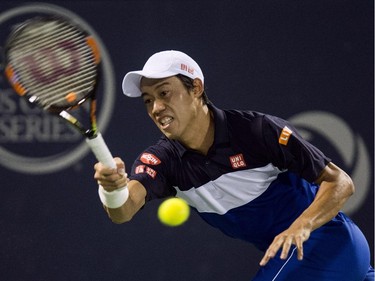 Kei Nishikori, of Japan, returns to David Goffin, of Belgium, during round of sixteen play at the Rogers Cup tennis tournament on Thursday, August 13, 2015, in Montreal.