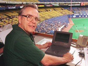 Former Montreal Gazette sportswriter Ian MacDonald in the press box at Olympic Stadium covering the Expos.