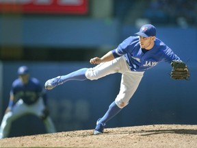 Toronto Blue Jays' starting pitcher Marco Estrada throws against the New York Yankees during sixth inning AL baseball action in Toronto on Saturday, August 15, 2015.