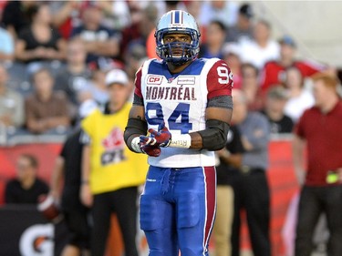 Montreal Alouettes' Michael Sam (94) takes to the field for his first professional debut against the Ottawa Redblacks during the first half of a CFL game in Ottawa on Friday, Aug. 7, 2015.