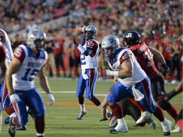 Montreal Alouettes quarterback Rakeem Cato (12) throws the ball against the Ottawa Redblacks during the first half of a CFL game in Ottawa on Friday, Aug. 7, 2015.