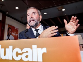 Federal NDP leader Tom Mulcair campaigns on Friday, August 28, 2015 at Jim Hughes' campaign office in the Westmount-NDG riding in Montreal.