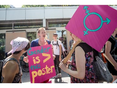 MONTREAL, QC.: AUGUST 9, 2015 -- Lisa Doell shows her sign at the Montreal Trans March 2015, at Place-des-Arts, in Montreal, Quebec, on Sunday August 9, 2015. (Giovanni Capriotti / MONTREAL GAZETTE)