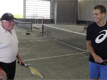 The Montreal Gazette's Pat Hickey has a laugh with  Canadian tennis star Vasek Pospisil Monday, August 10, 2015 prior to a short exhibition at the Rogers Cup at Jarry tennis stadium. (Screen grab from video)