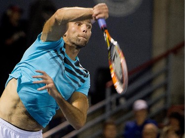 Ivo Karlovic (CRO) serves the ball to ilos Raonic (CAN) during Rogers Cup action in Montreal on Tuesday August 11, 2015.