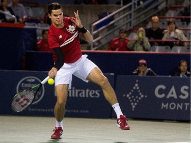 Milos Raonic (CAN) returns the ball to Ivo Karlovic (CRO) during Rogers Cup action in Montreal on Tuesday August 11, 2015.