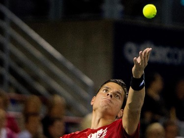 Milos Raonic (CAN) serves the ball to Ivo Karlovic (CRO) during Rogers Cup action in Montreal on Tuesday August 11, 2015.