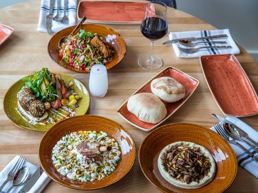 The fattoush, top, falafel, middle left, fattet mozat, bottom left, and hummus lahme, bottom right, at Damas, on Van Horne Ave. in Montreal.