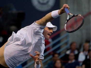 John Isner (USA) serves the ball to Vasek Pospisil (CAN)  during Rogers Cup action in Montreal on Wednesday August 12, 2015.