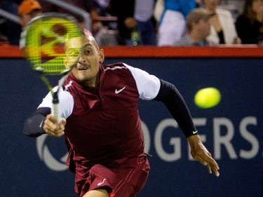 Nick Kyrgios (AUS) returns the ball to Stan Wawrinka (SUI)  during Rogers Cup action in Montreal on Wednesday August 12, 2015.
