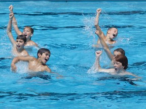 Some of the members of the Beaconsfield Heights pool boys synchronized swimming team go through a routine at the pool in Beaconsfield. Team head coach Chris Callard always wanted to do synchronized swimming but was told it was only for girls.