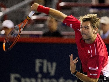 Stan Wawrinka (SUI) serves the ball to Nick Kyrgios (AUS) during Rogers Cup action in Montreal on Wednesday August 12, 2015.