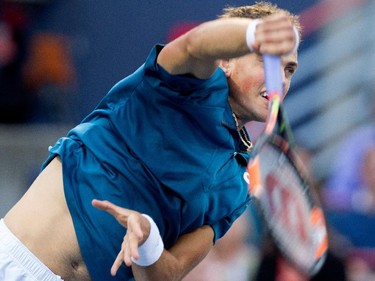 Vasek Pospisil (CAN) serves the ball to John Isner (USA) during Rogers Cup action in Montreal on Wednesday August 12, 2015.