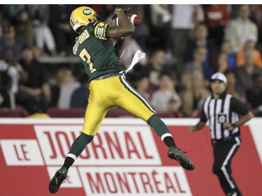 Edmonton Eskimos Kenny Stafford makes a touchdown during Canadian Football League game against the Alouettes in Montreal Thursday August 13, 2015.