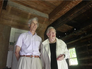 Retired architect David Kininmonth, left and Judith Duncanson from the Paul Holland Knowlton House Committee, right, stand inside the historic Paul Knowlton House. The house was saved from demolition last year and restored.It will open to the public for the first time on Saturday at its new home at the Brome County Historical Society Museum located in Knowlton,  an hour and a half drive from Montreal in the Eastern Townships.