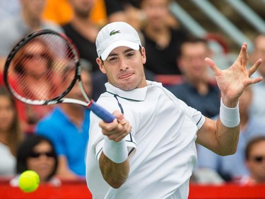John Isner of the United States against Jeremy Chardy of France during their quarter-finals tennis match for the Roger's Cup Tennis Tournament at Uniprix Stadium in Montreal on Friday, August 14, 2015.