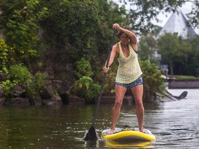 Jill Barker takes to her paddle board on Lac Saint-Louis in Pointe-Claire.