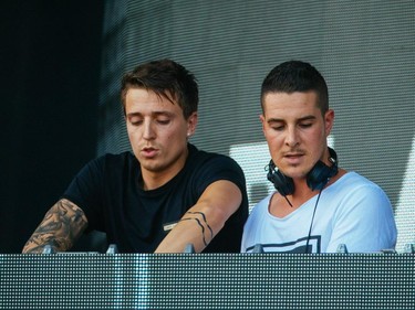 Idir Makhlaf, right, and Thom Jongkind, left, of Blasterjaxx perform at the ÎleSoniq music festival at Jean-Drapeau Park in Montreal on Saturday, August 15, 2015.