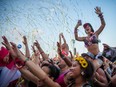 Music fans enjoy the performance by the Dutch DJ duo Showtek at the ÎleSoniq music festival at Jean-Drapeau Park in Montreal on Saturday, August 15, 2015.