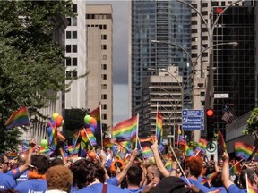 “The feeling of belonging to the LGBT movement is slightly higher in Quebec than in other Canadian provinces,” a new survey reports. Above: Montrealers cheer on the annual Pride Parade in August 2014.