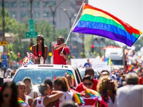Revellers and spectators take part in the 2013 Pride Parade in downtown Montreal.