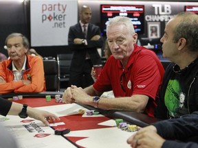 Canadiens legend Larry Robinson, (middle) is one of a handful Montreal Canadiens alumni taking part in a charity poker tournament Friday Aug. 21, 2015 and Saturday at Playground Poker in Kahnawake.