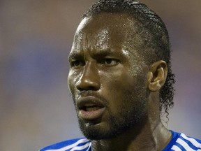 Didier Drogba has an intense look for an official in his debut for the Montreal Impact against the Philadelphia Union in M.L.S. action at Saputo Stadium in Montreal Saturday, August 22, 2015.