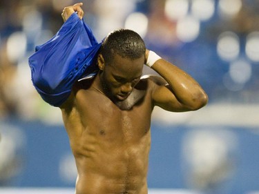 Didier Drogba, who was making his debut for the Montreal Impact, takes his jersey off at the end of the game against the Philadelphia Union in M.L.S. action at Saputo Stadium in Montreal Saturday, August 22, 2015.