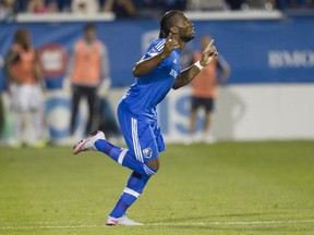 International soccer superstar from the Ivory Coast Didier Drogba touches the turf as he comes into the game in his debut for the Montreal Impact against the Philadelphia Union in M.L.S. action at Saputo Stadium in Montreal Saturday, August 22, 2015.