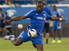 International soccer superstar from the Ivory Coast Didier Drogba takes part in the warm-up in his debut with Montreal Impact against the Philadelphia Union in M.L.S. action at Saputo Stadium in Montreal Saturday, August 22, 2015.