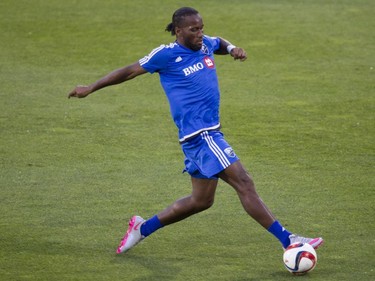 International soccer superstar from the Ivory Coast Didier Drogba takes part in the warm-up in his debut with Montreal Impact against the Philadelphia Union in M.L.S. action at Saputo Stadium in Montreal Saturday, August 22, 2015.