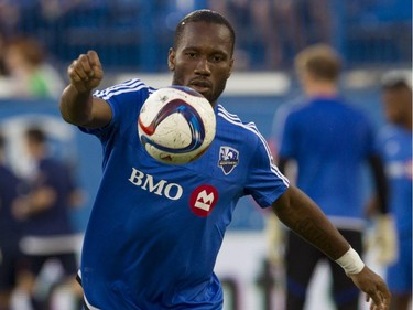 International soccer superstar from the Ivory Coast Didier Drogba takes part in the warm-up in his debut with Montreal Impact against the Philadelphia Union in M.L.S. action at Saputo Stadium in Montreal Saturday, August 22, 2015.