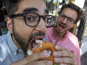 Thierry Rassam has hungry eyes as his Burger Week partner Na'eem Adam wraps his mouth around Chez Boris's special, featuring a doughnut bun and a patty made of quinoa and black beans. “We are two guys who just really love food, good times and bringing people together,” Rassam says.