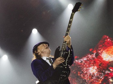 Guitarist Angus Young of the Australian hard rock band AC/DC performs at the Olympic Stadium in Montreal Monday, August 31, 2015. The rockers AC/DC were back in town in support of last year's Rock or Bust album.