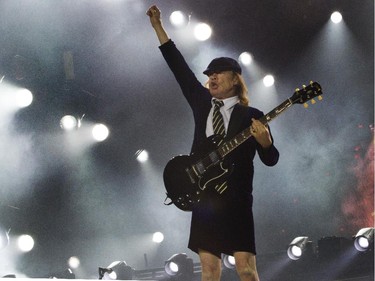 Guitarist Angus Young of the Australian hard rock band AC/DC performs at the Olympic Stadium in Montreal Monday, August 31, 2015. The rockers AC/DC were back in town in support of last year's Rock or Bust album.