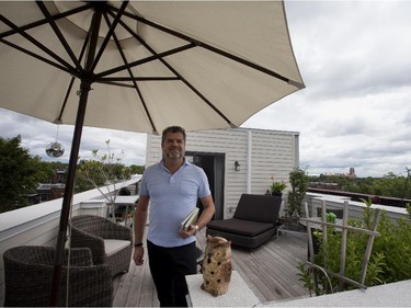 Eric Arminjon on his terrace in his home in Rosemont-la-Petite-Patrie area of Montreal.