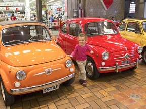 Cerine Fellahi was enjoying seeing an array of classic Fiat 500 cars on display at Centre Commercial Le Boulevard on Friday, Aug. 7, 2015, in Montreal. The display of the cars was part of Montreal's Italian Week.