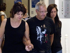 Family and supporters of Cheryl Bau-Tremblay enter a Ste-Hyacinthe courtroom Friday, Aug. 7, 2015.