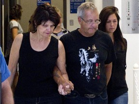 Familiy and supporters of Cheryl Bau-Tremblay enters a St. Hyacinthe courtroom Aug. 7, 2015.   Her partner Alexandre Gendron has been charged with her murder.