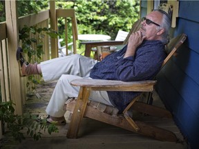 Writer Paul William Roberts on the porch of his Val-des-Lacs home, where he's lived for the last five years. “I have always yearned to be in an isolated place.”