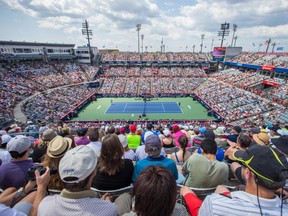 Fans watch the Rogers Cup at Uniprix Stadium in 2014.