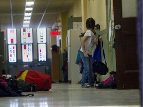 A student prepares to go back to class after a lunch break.