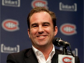 Canadiens owner Geoff Molson flashes smile during a news conference in Montreal on Jan. 7, 2013.