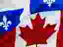 Canada and Quebec flags.