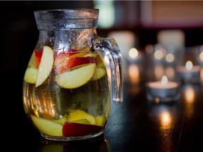 A pitcher of white wine with peaches, part of our 2012 5 à 7 summer cocktail series.