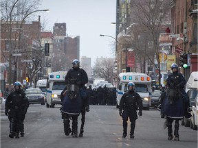 Riot police and mounted police clear de Maisonneuve after kettling protesters in Montreal as they mark the one year anniversary of the largest demonstration that drew more than 100,000 people in 2012 against student fee hikes Friday March 22, 2013.