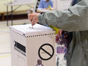 A ballot is cast in the 2011 federal election.