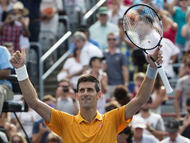 Novak Djokovic, of Serbia, celebrates his victory over Jeremy Chardy, of France, during the semifinals at the Rogers Cup tennis tournament on Saturday, August 15, 2015, in Montreal. Djokovic won 6-4, 6-4 to move on to the final.