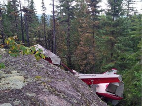 Quebec provincial police say this Air Saguenay plane went down over the weekend of August 23, 2015 in a wooded area six kilometres from the community of Les Bergeronnes. Police say four people are dead and two others are missing after the seaplane crashed on the province's North Shore.