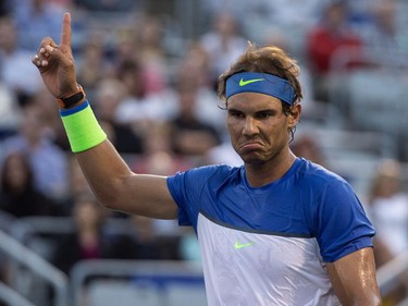 Rafael Nadal of Spainchalenges a call during his match against Mikhail Youzhny of Russia during round of sixteen play at the Rogers Cup tennis tournament Thursday August 13, 2015 in Montreal.